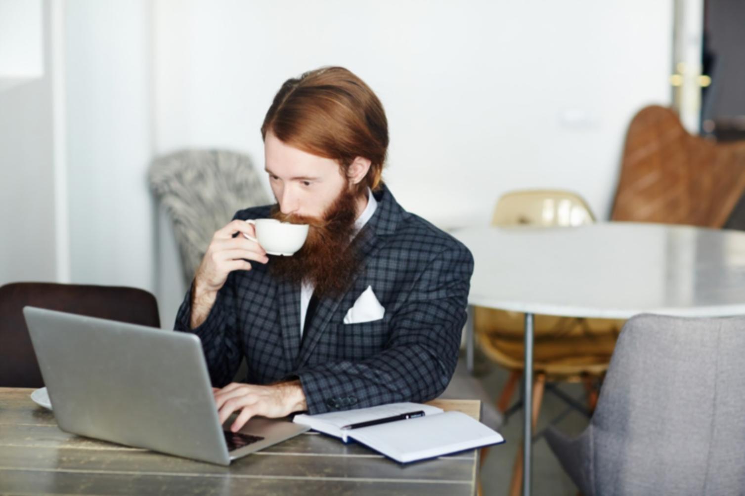 Network administrator analyzing server room equipment during troubleshooting process