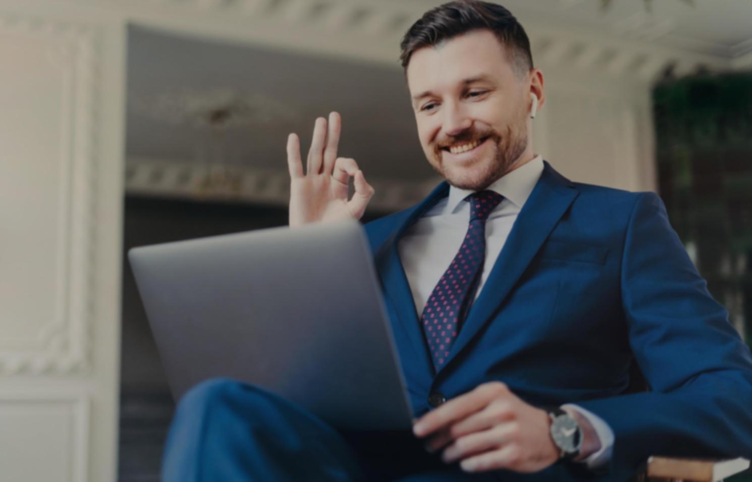 Professional analyzing network traffic patterns on multiple monitors